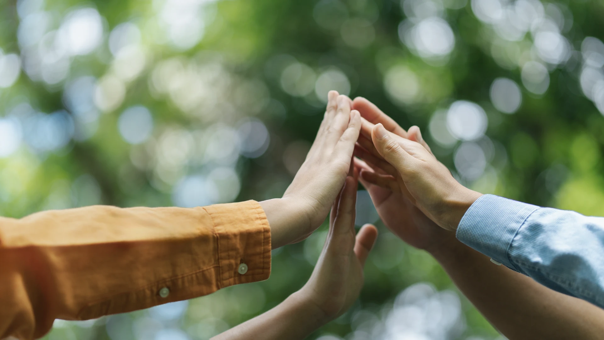 Environmental concept, business people join forces on World Environment Day and global community teamwork the global environment, society and